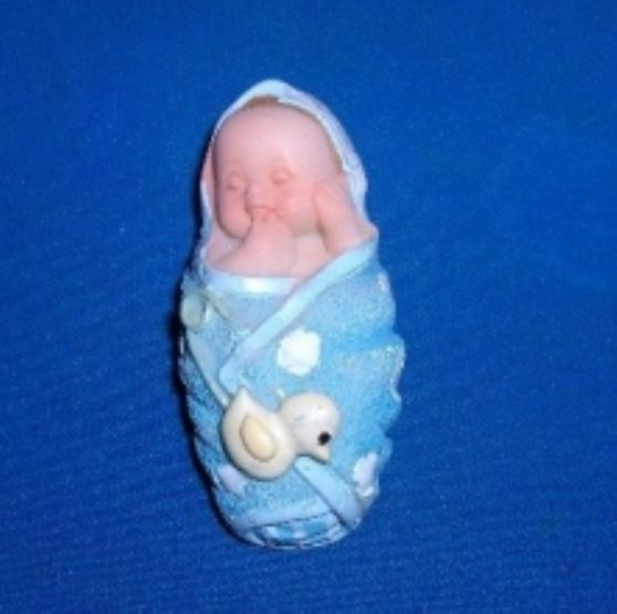 BEBÉ COM PATINHO