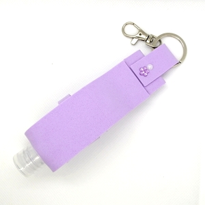 Bolsa lilás com frasco para alcool gel