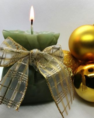 Vela de Natal em forma de saquinho de presente